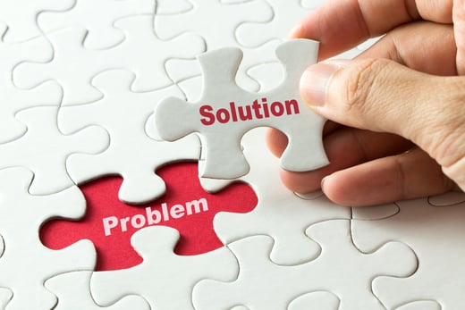Our Solutions - problem solution puzzle pieces AdobeStock_118424806